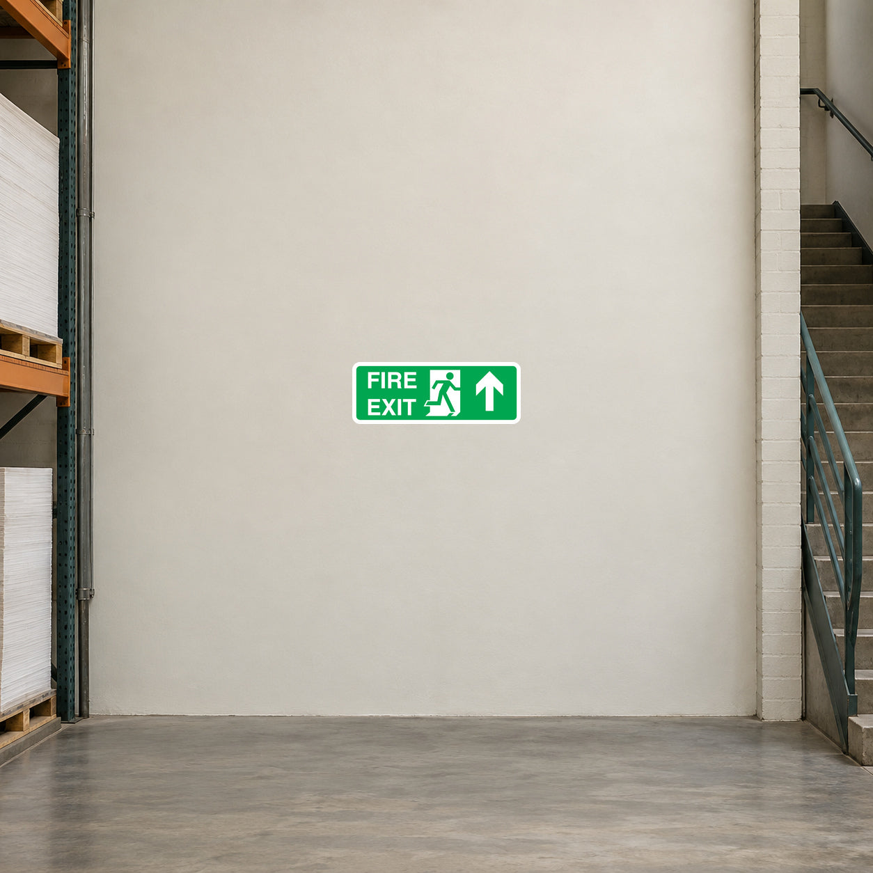 Green fire exit sticker with running person and right arrow and straight arrow