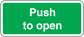 Green safety sign sticker with white border reading “Push to open”