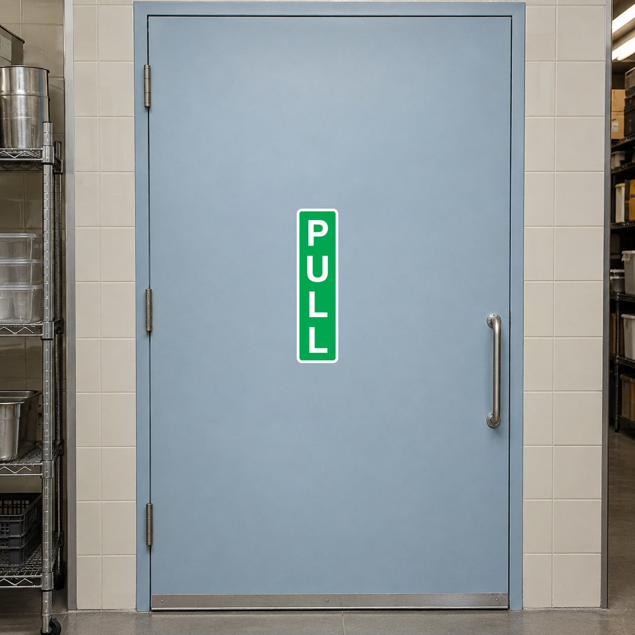 Green vertical PULL sticker on light blue door panel