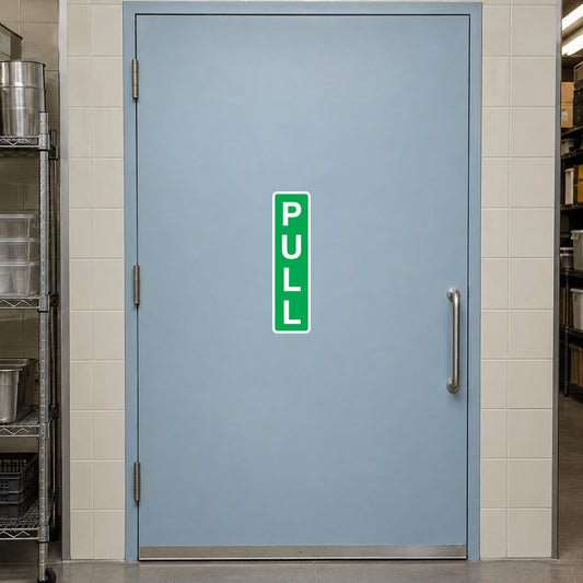 Green vertical PULL sticker on light blue door panel