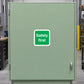 Safety first sign sticker: green text on white bordered square