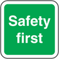 Green safety sign sticker with white text: Safety first