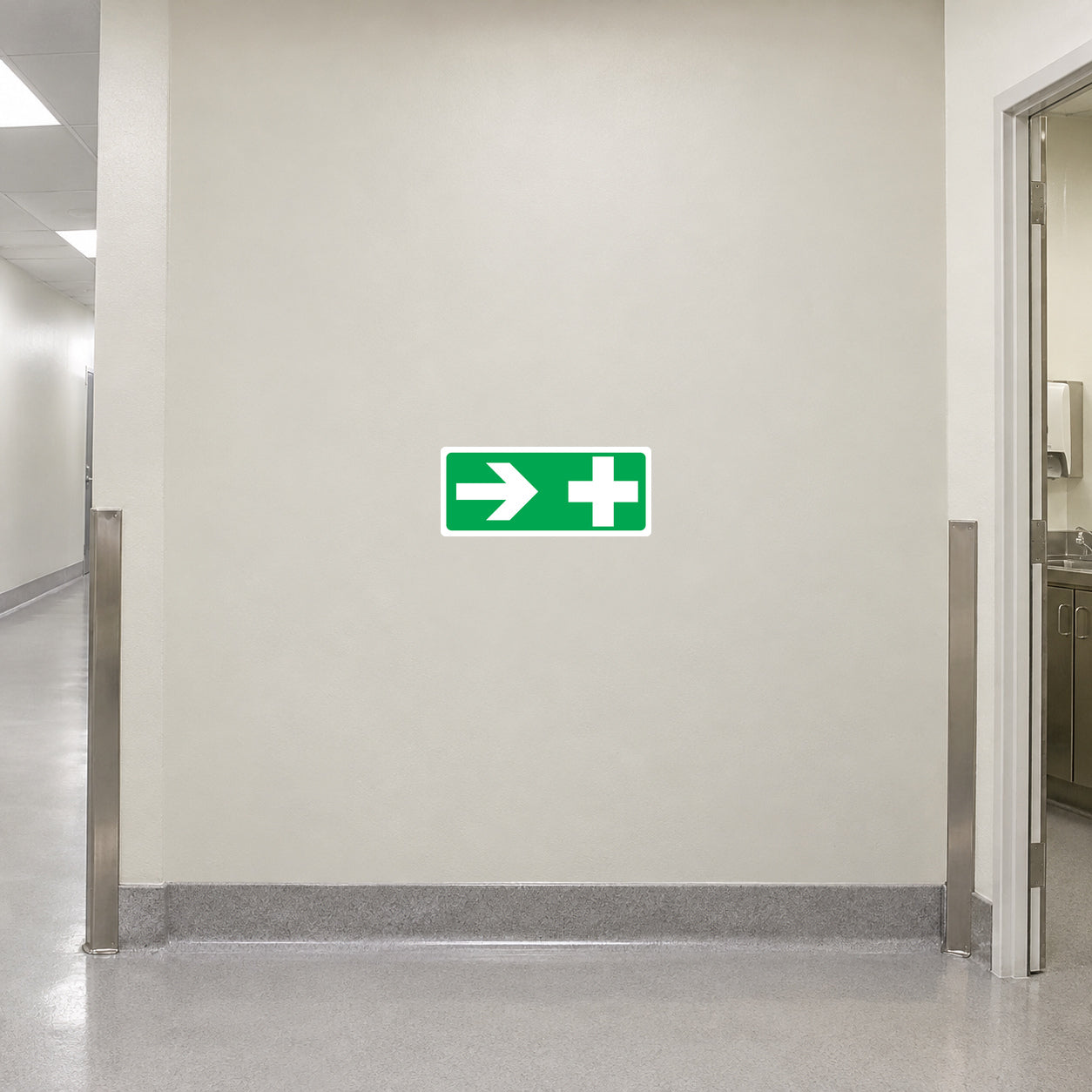 Green directional sticker with right arrow and plus symbol