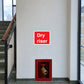 Red dry riser fire access sticker with 'Dry riser' text
