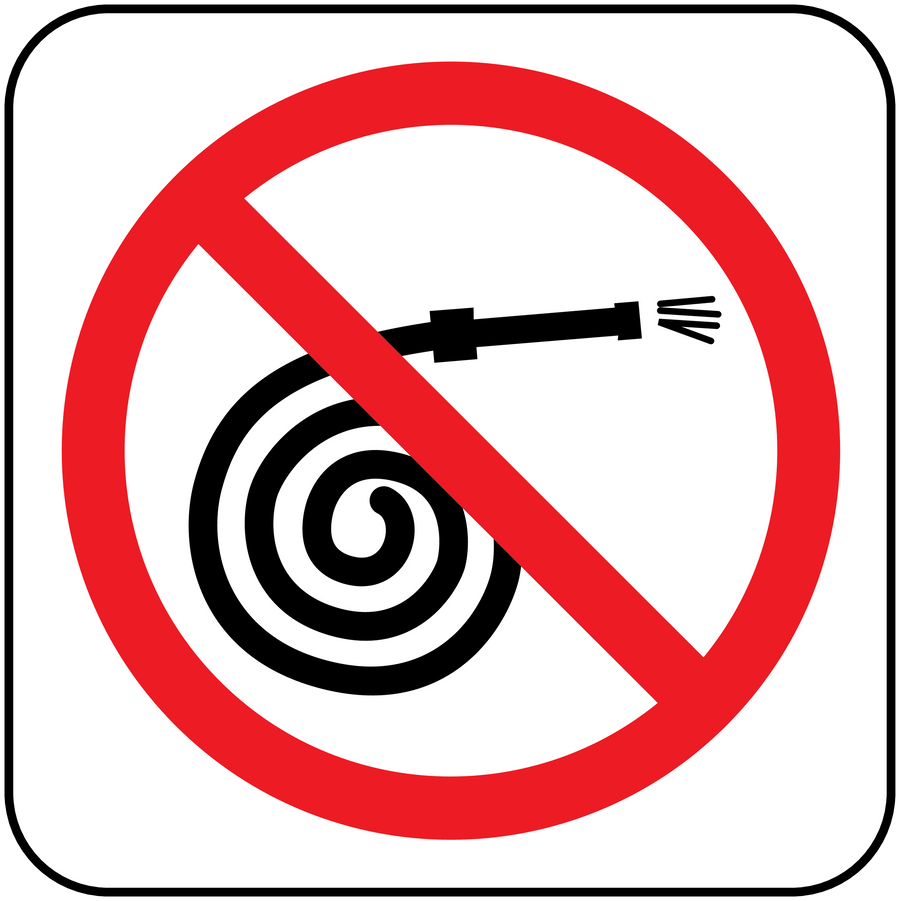 Red prohibition sticker with crossed-out fire extinguisher and target flame icon