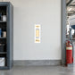 Foam fire extinguisher sticker with red label text on white vertical backing