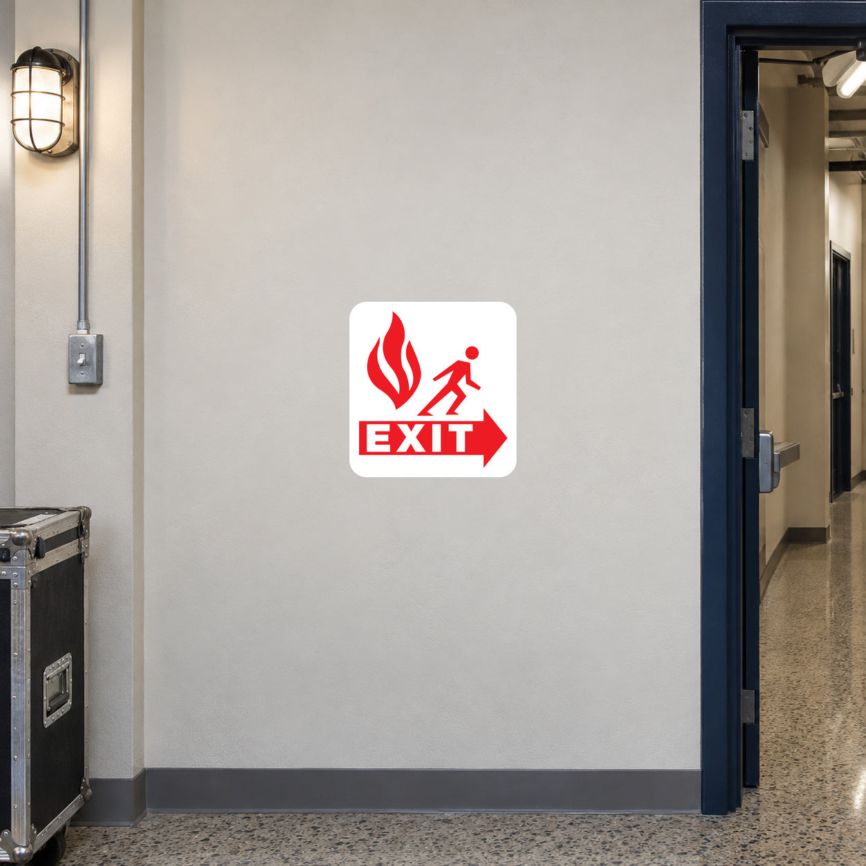 Fire exit safety sticker with red flame, running figure, and EXIT arrow on white