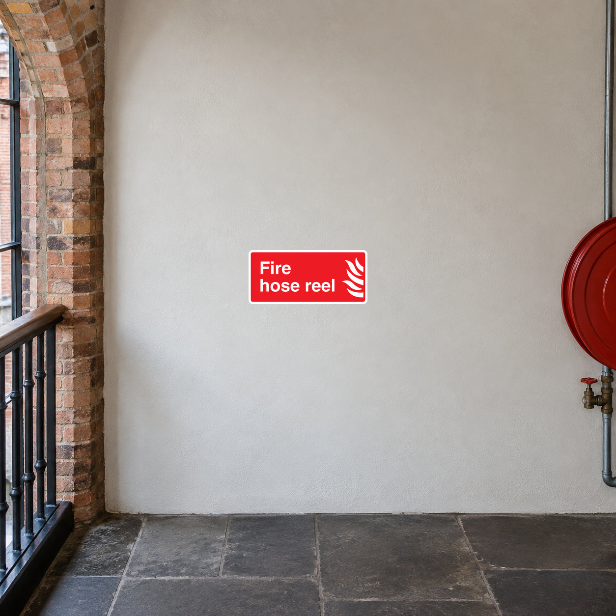 Fire hose reel sticker, red/white text 'Fire hose reel' with hose icon