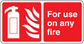 Fire safety sticker with extinguisher and flames icons; text: For use on any fire.