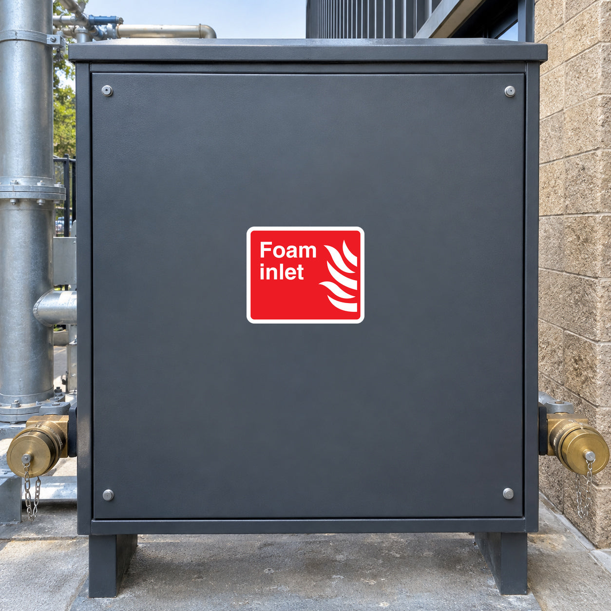 Fire foam inlet label sticker on dark gray metal access panel