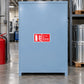 Blue fire safety cabinet with red-and-white sticker for flammable liquid fires