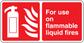 Red fire safety sticker with white gas can icon and text: For use on flammable liquid fires
