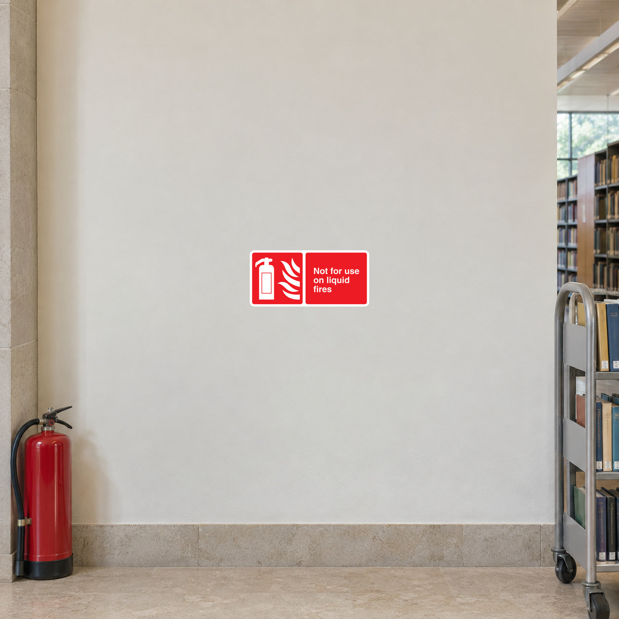 Red safety sticker reading 'Not liquid fires' with crossed-out flame icon