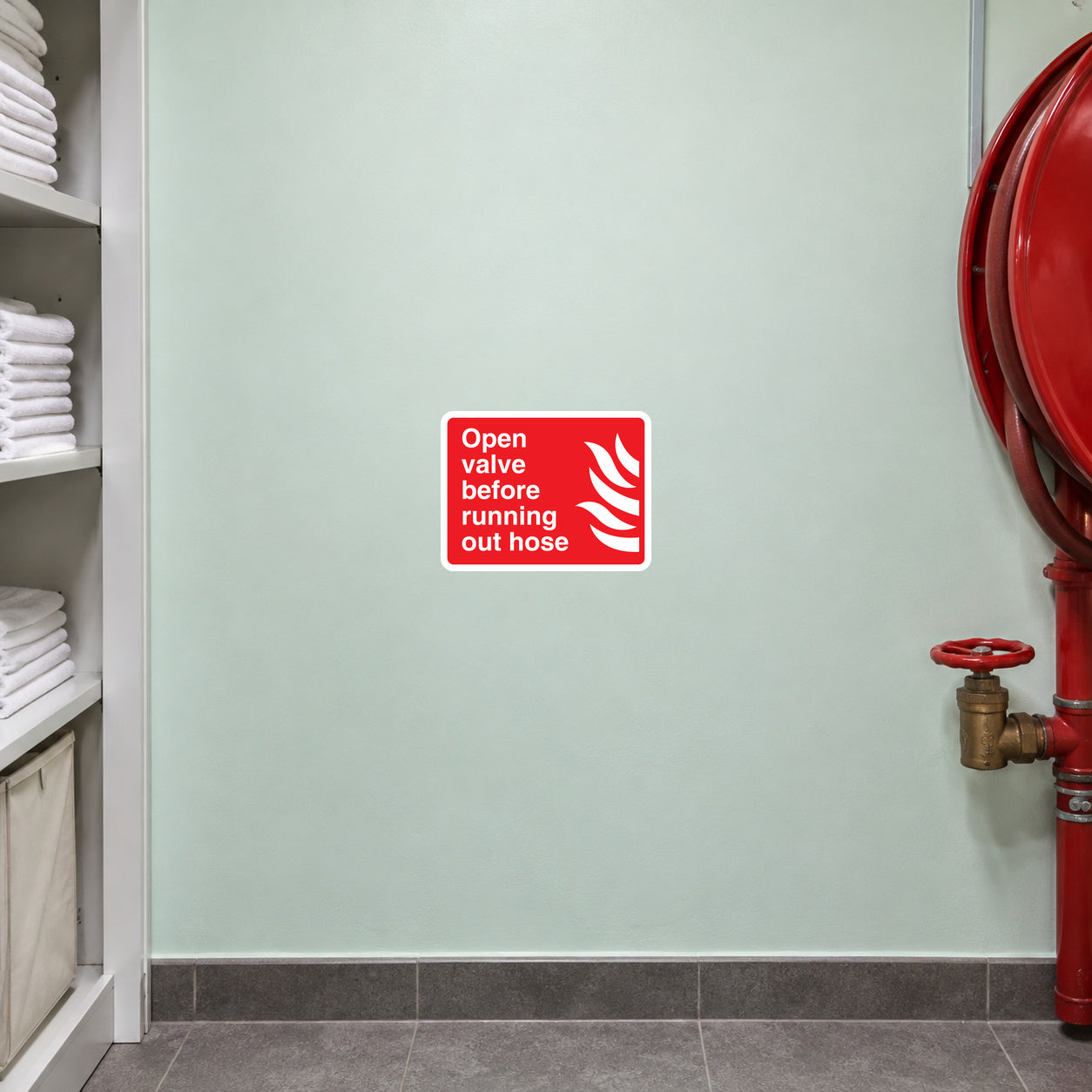 Red hose safety sticker with white text and flame icon