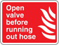 Red hose warning sticker: 'Open valve before running out hose' with white flame icon