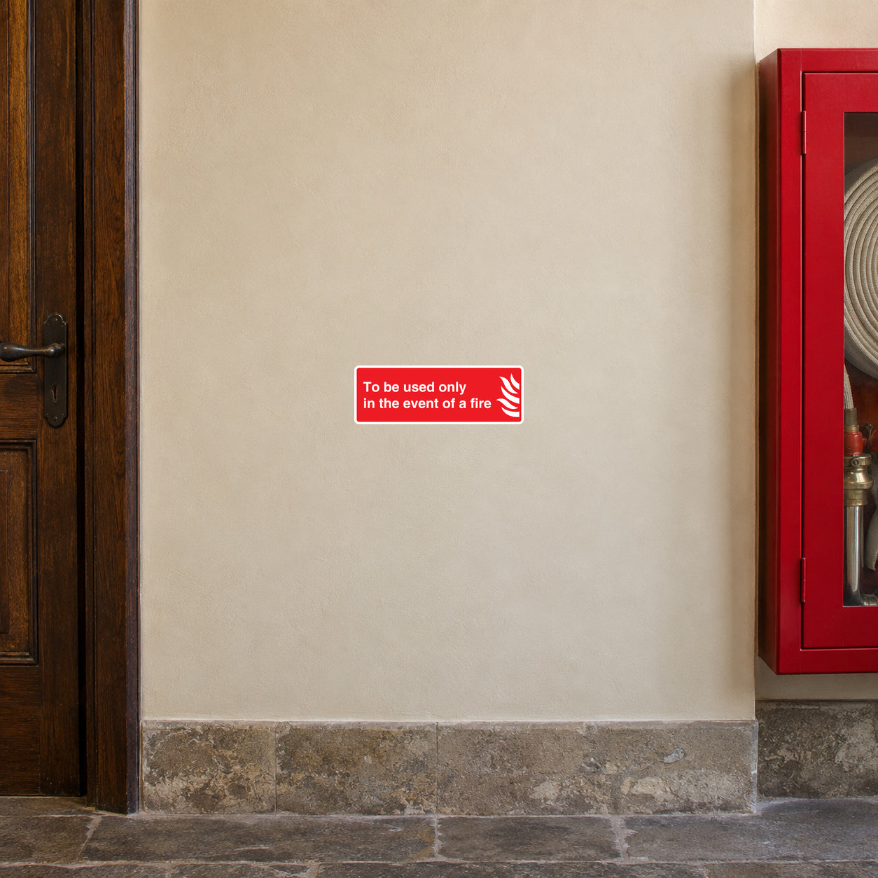 Red safety sticker: "To be used only in the event of a fire"