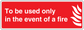 Red fire safety sticker with white text and flame icon