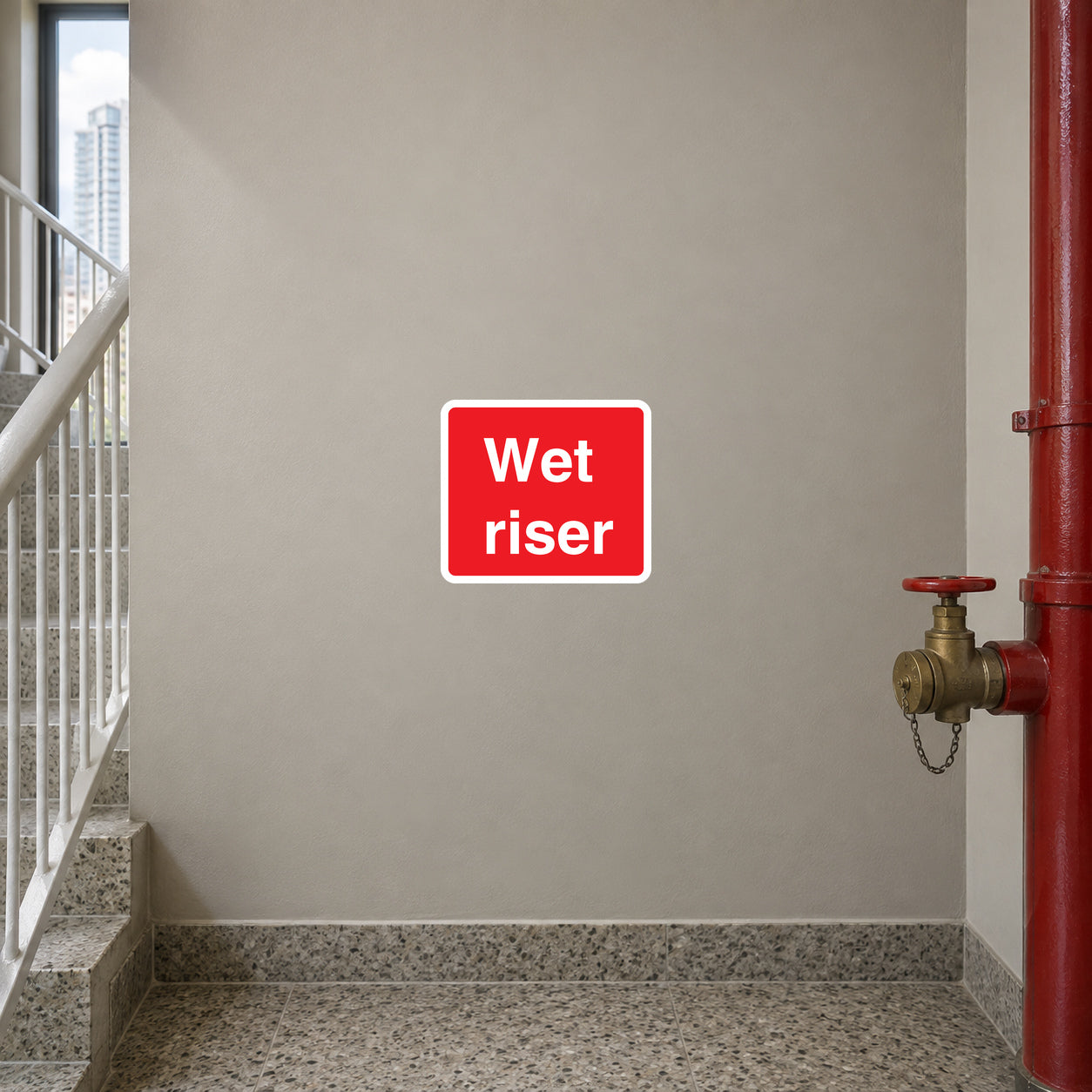 Wet riser fire sticker: red square with white border and white “Wet riser” text
