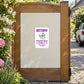 Butterfly Parking Only sticker on a private garden driveway gate