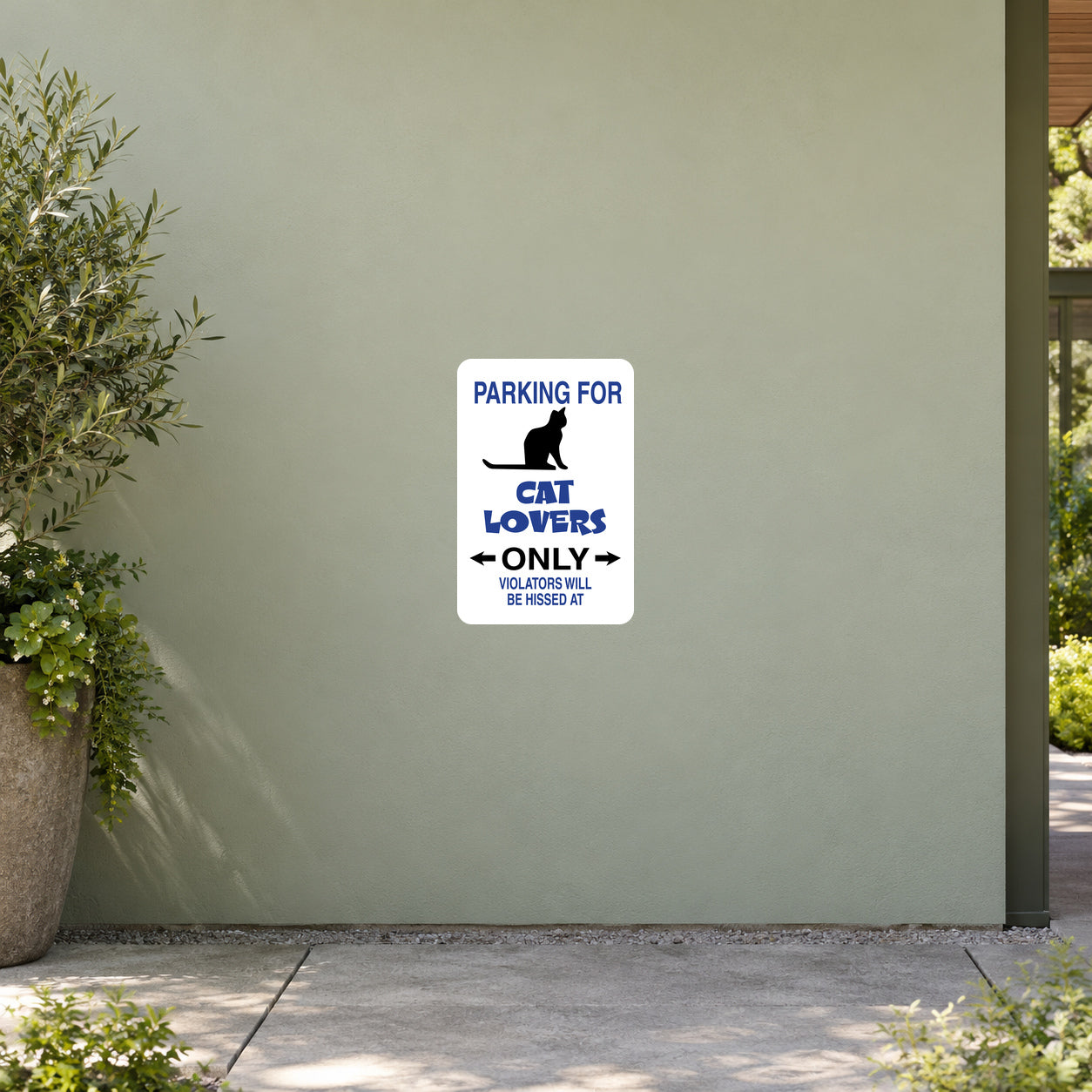 White square parking sticker with black cat silhouette and text “Parking for Cat Lovers Only”