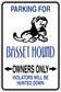 Parking for Basset Hound owners only sticker with dog and arrow warning text
