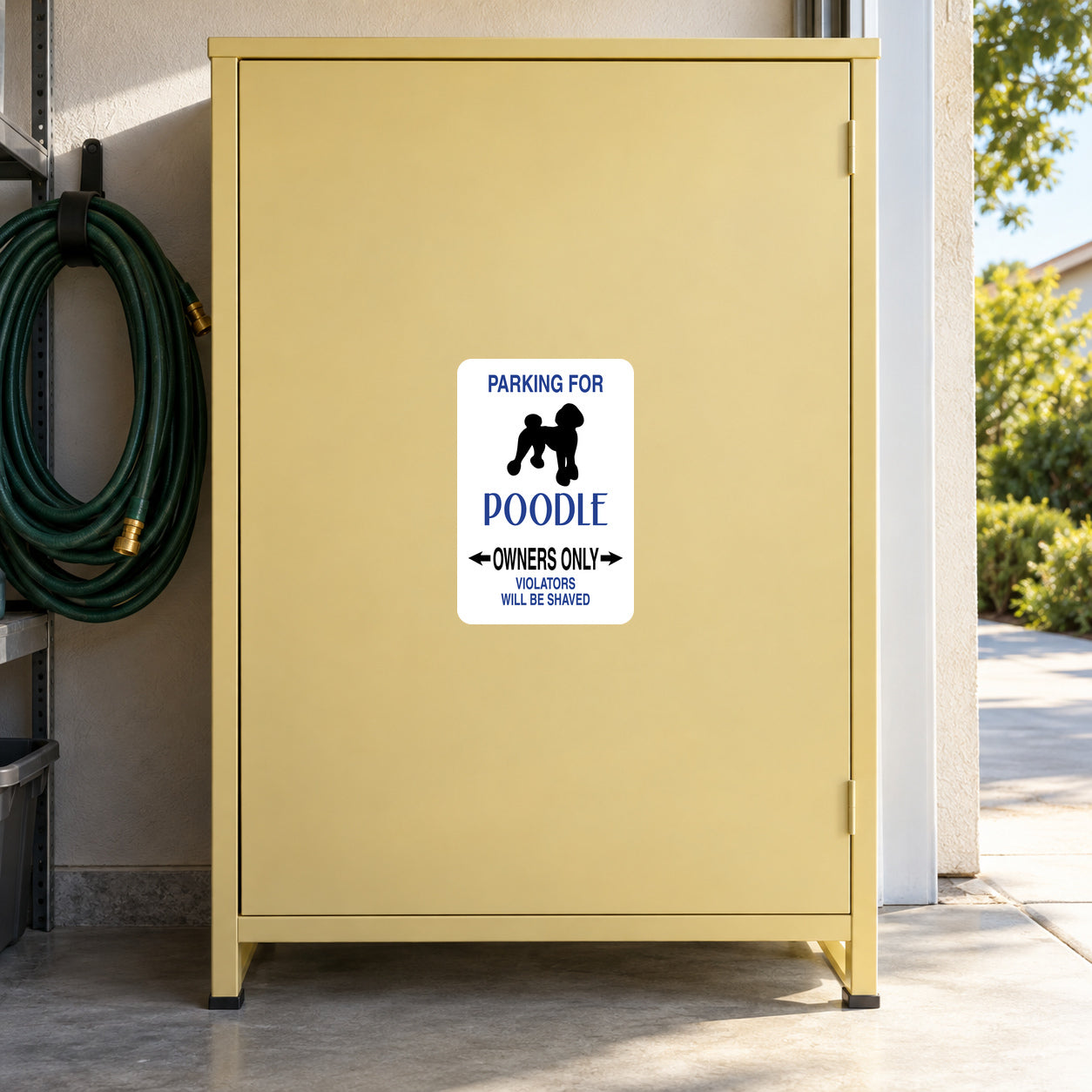 Parking For Poodle Owners OnlyFun Sign Sticker applied to a pale yellow private garage cabinet