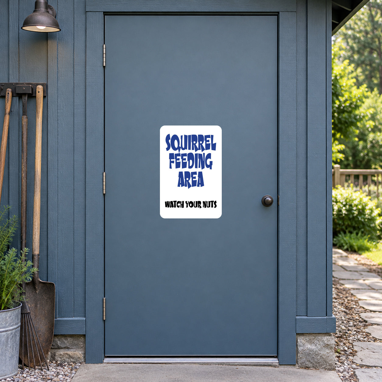 Squirrel feeding area fun sign sticker with blue text and "Watch your nuts"
