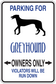 Parking sign sticker for owners only, with dog silhouette and warning text