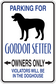 Parking sign sticker: Gordon Setter silhouette, 'Owners only' and 'violators will be in the doghouse'.