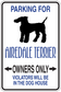 Parking sign sticker reading owners only with Airedale Terrier silhouette