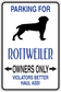 Rectangular parking sign sticker: rottweiler silhouette, blue 'Owners only' text