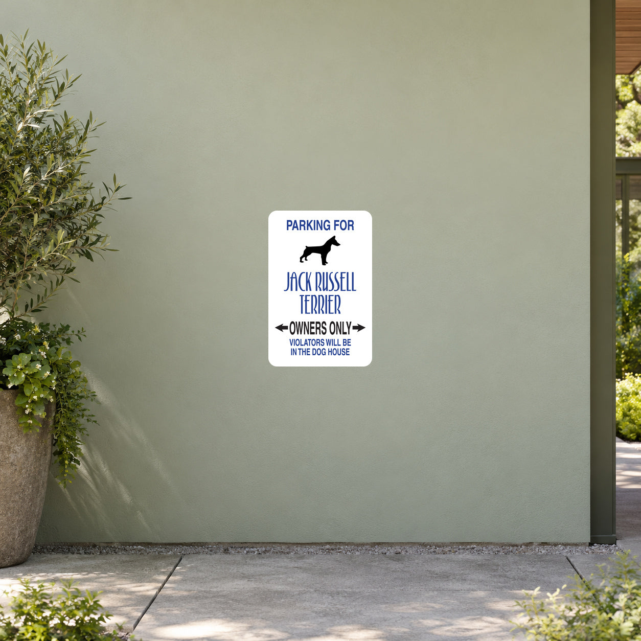 Parking For Jack Russel Terrier Owners Only Fun Sign Sticker applied to a pale sage garden visitor centre wall