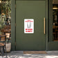 White sign sticker with cartoon mug and text "My glass is empty" on door