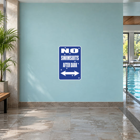 Blue No Swimsuits After Dark sign sticker with arrows and white lettering