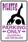 Pilates parking only sticker: purple arrows and text with black balancing silhouette