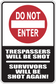 Warning sticker with red 'Do Not Enter' sign and text 'Trespassers will be shot'.