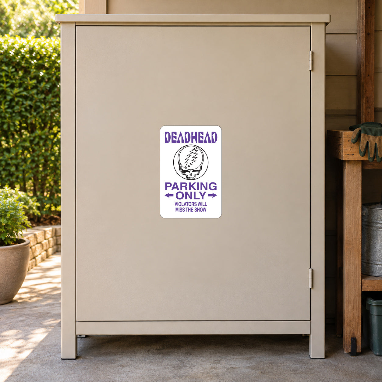Deadhead Parking Only Sticker applied to a beige private driveway workshop cabinet