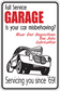 Garage service sticker with red text, car illustration, and repair message