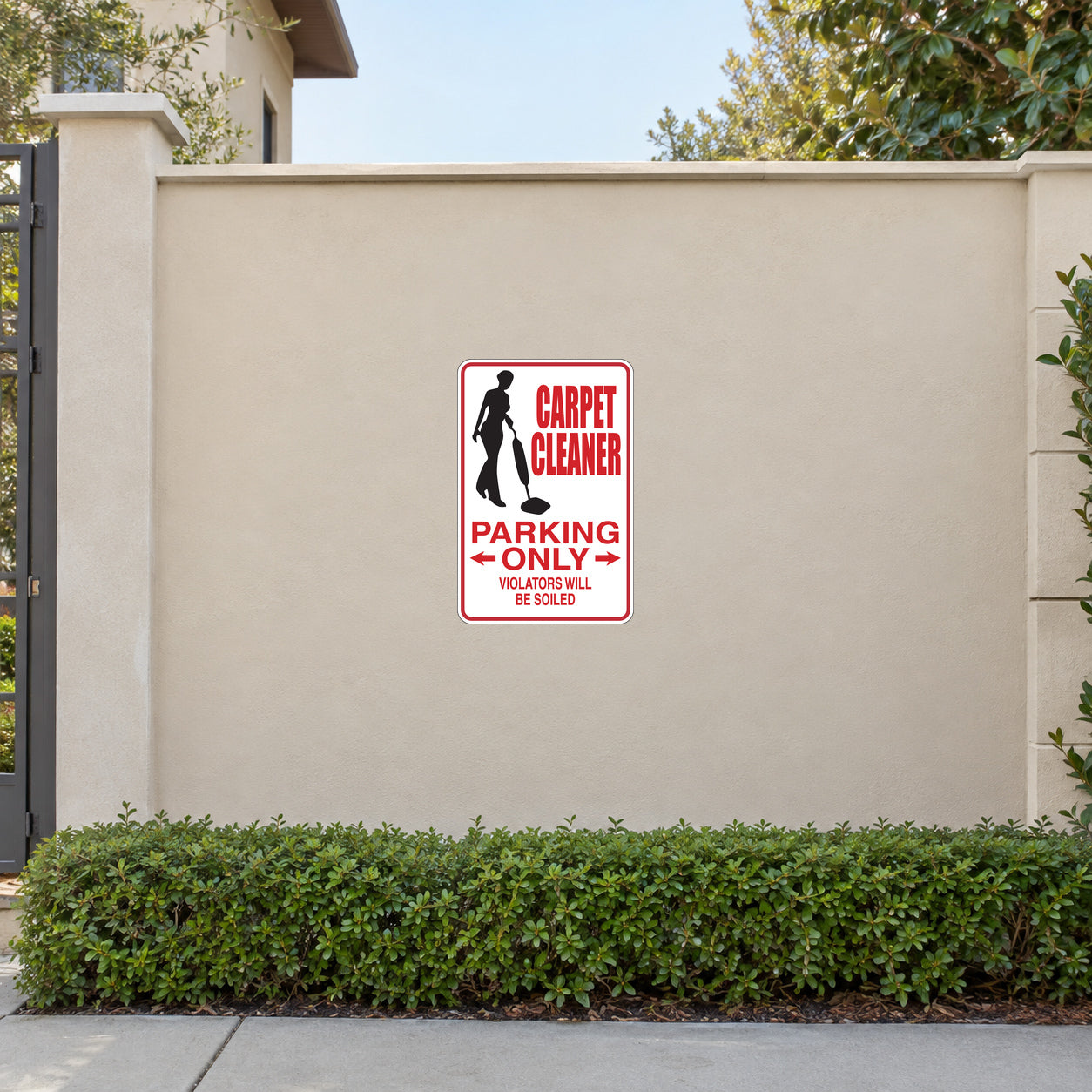 Red rectangular parking-only sticker with carpet cleaner icon and warning text