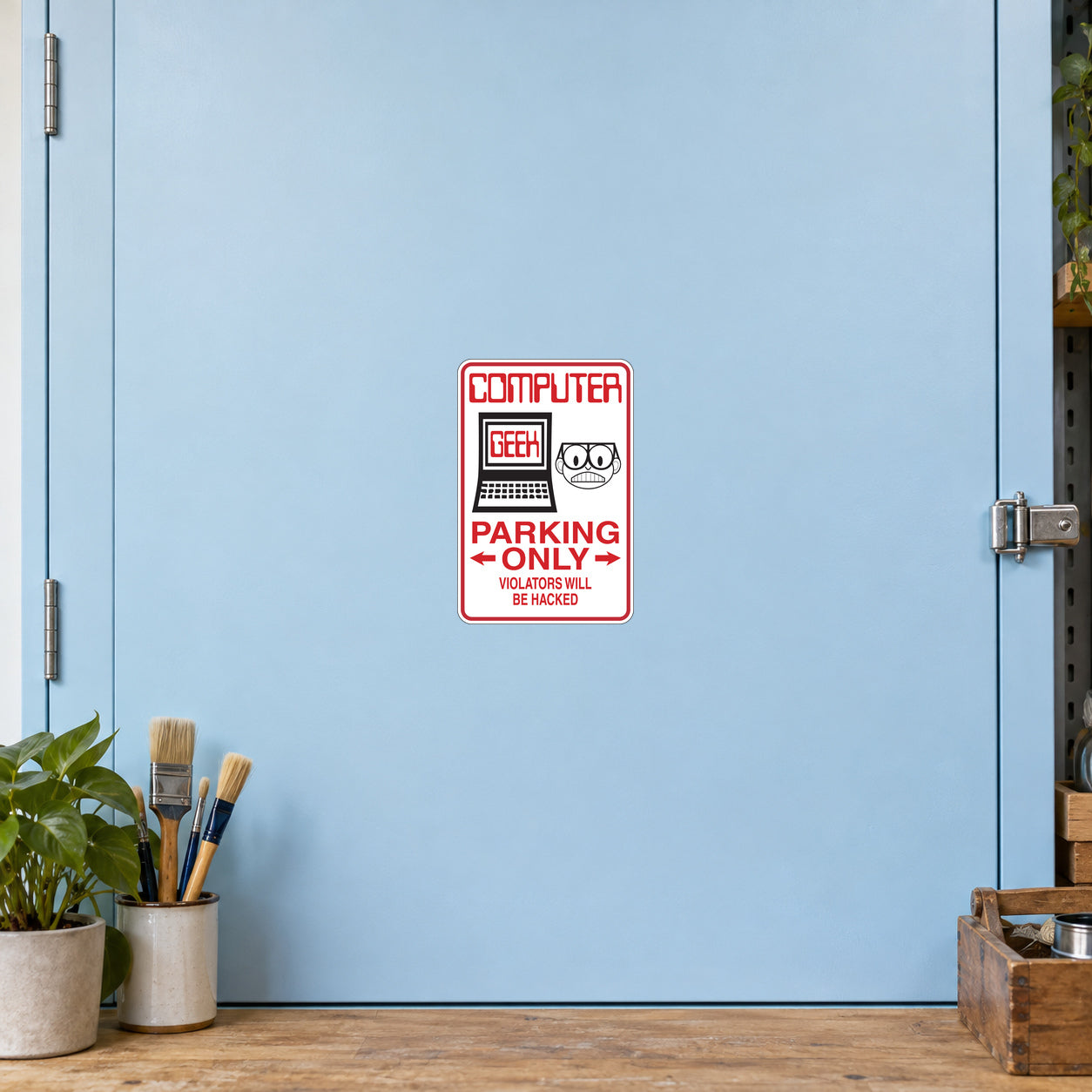 Computer Geek Parking only Sticker applied to a pale blue creative workshop cabinet