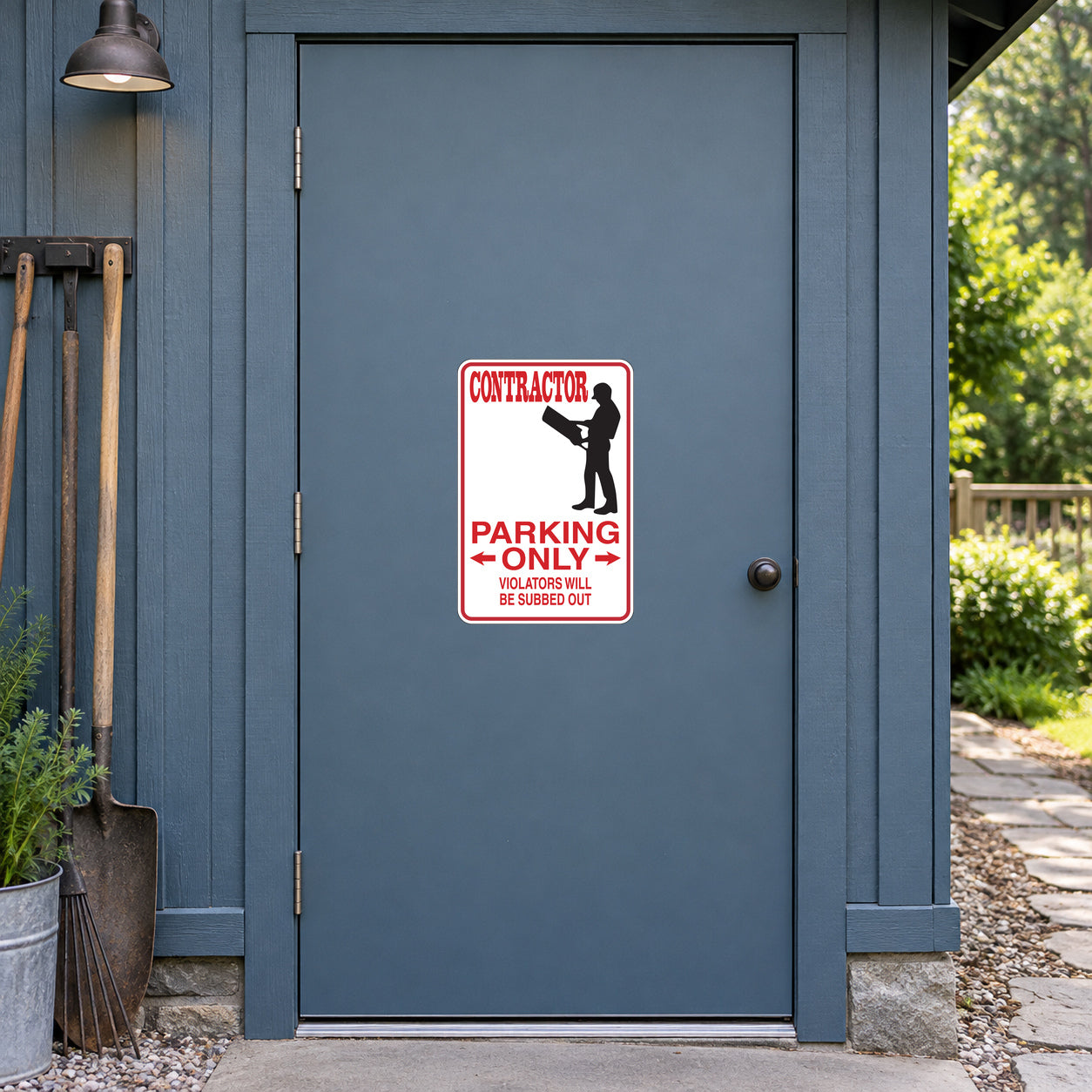 Contractor Parking Only Sticker applied to a slate blue rural workshop door