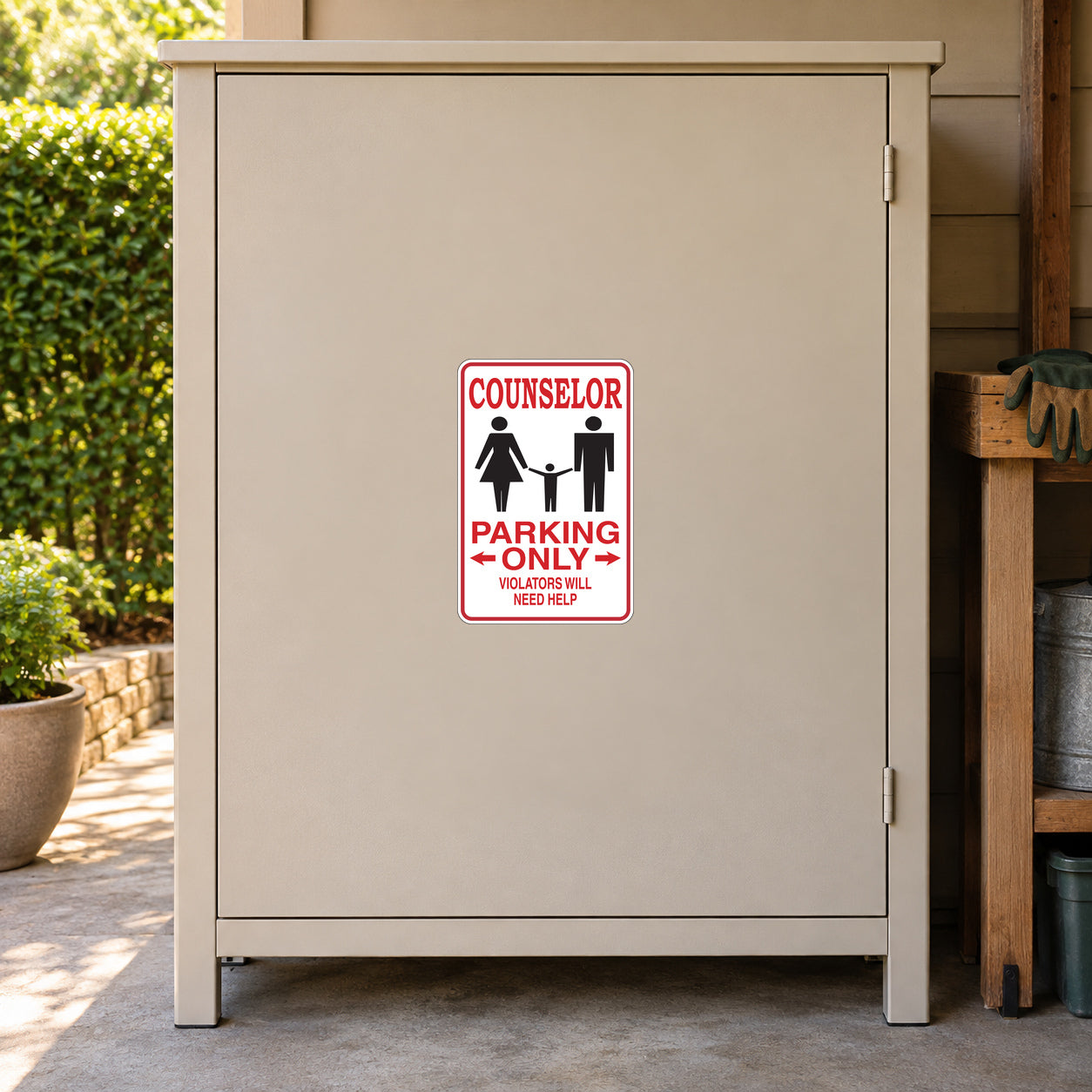 Counselor Parking Only Sticker applied to a beige private driveway workshop cabinet