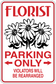 Florist parking only sticker with daisies; red 'PARKING ONLY' and 'VIOLATORS WILL BE REARRANGED'.