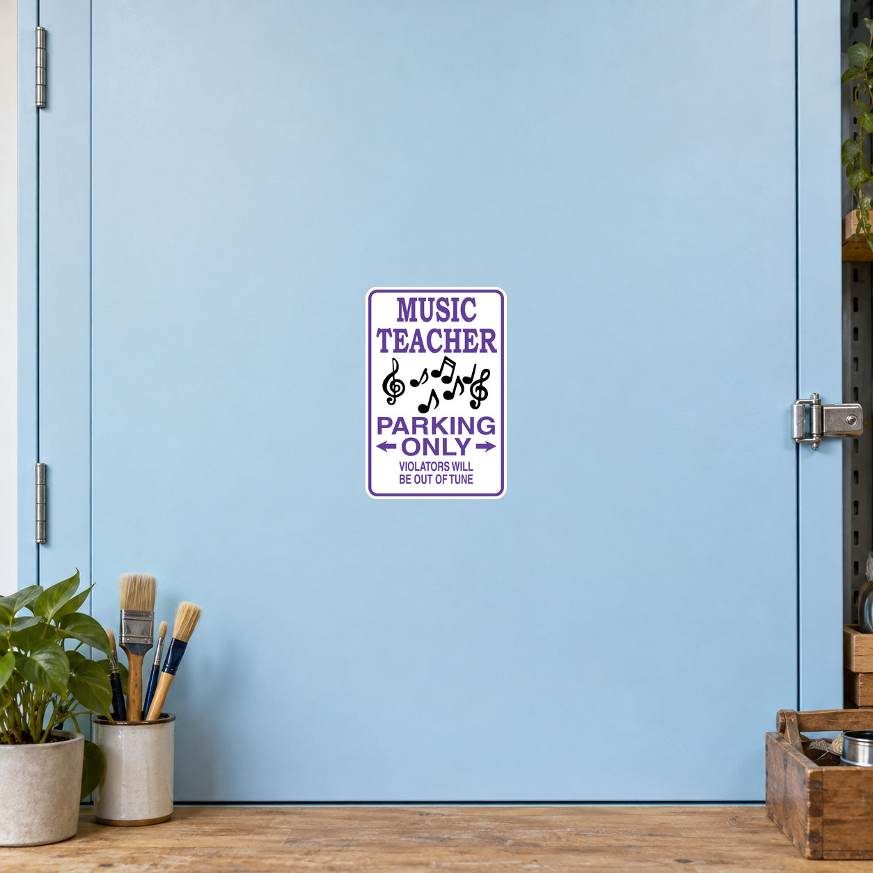 Fun Sign Sticker applied to a pale blue creative workshop cabinet