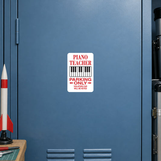 White rectangular sign sticker reading "PIANO TEACHER" and "PARKING ONLY".