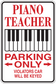 Rectangular sign sticker reading “Piano Teacher” and “Parking Only,” with piano keys graphic
