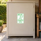 Fun Sign Sticker applied to a beige private driveway workshop cabinet