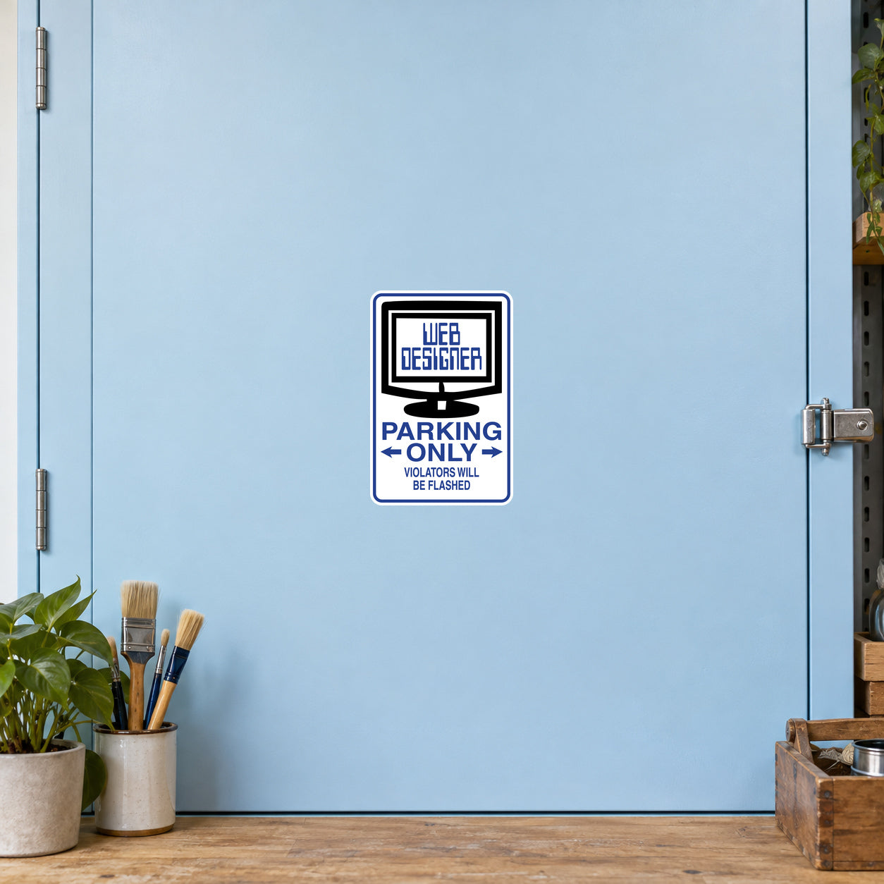 Fun Sign Sticker applied to a pale blue creative workshop cabinet