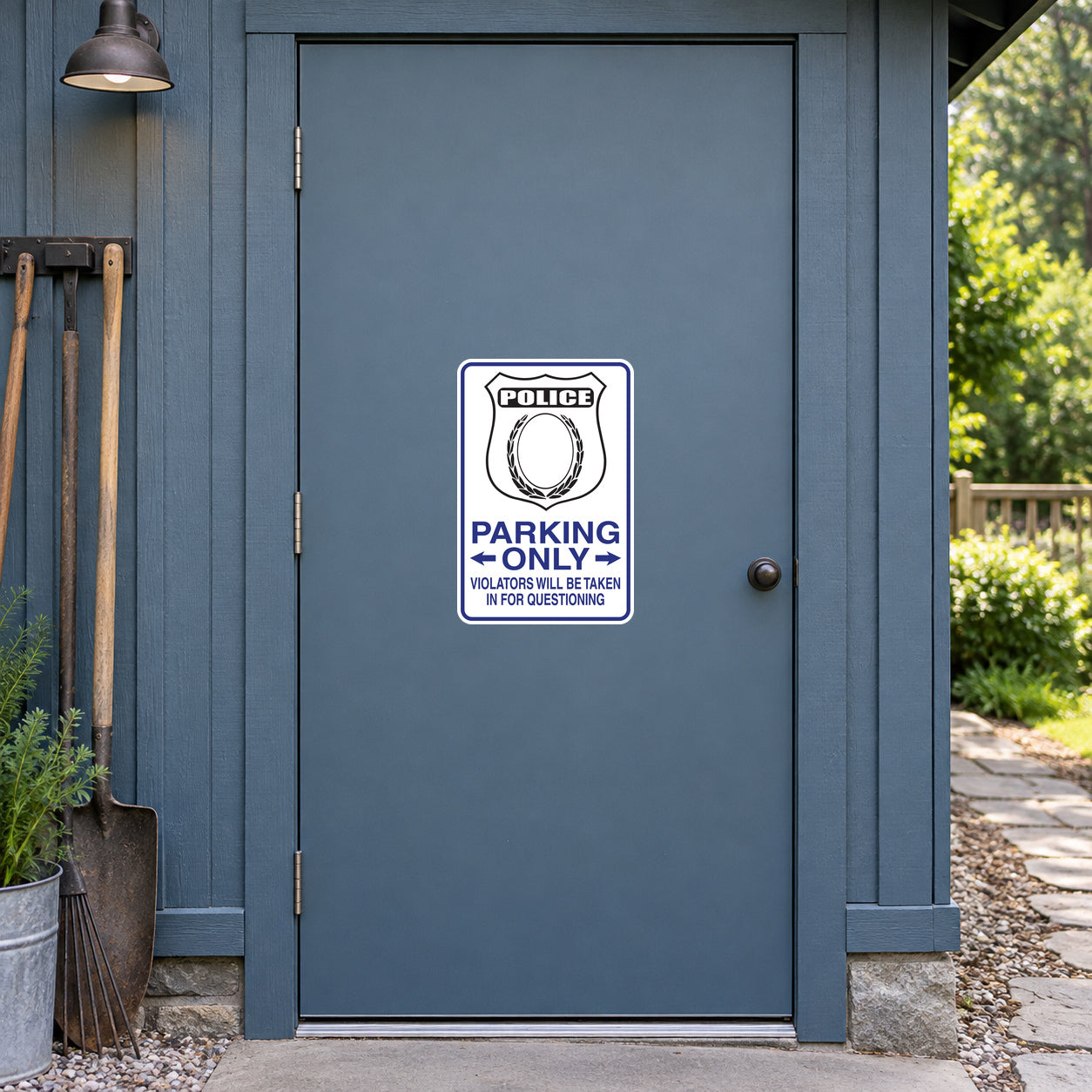 Fun Sign Sticker applied to a slate blue rural workshop door