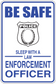 Blue fun sign sticker with 'BE SAFE', police badge, and 'SLEEP WITH A LAW ENFORCEMENT OFFICER'